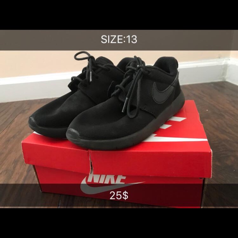 Girl black nike sneakers